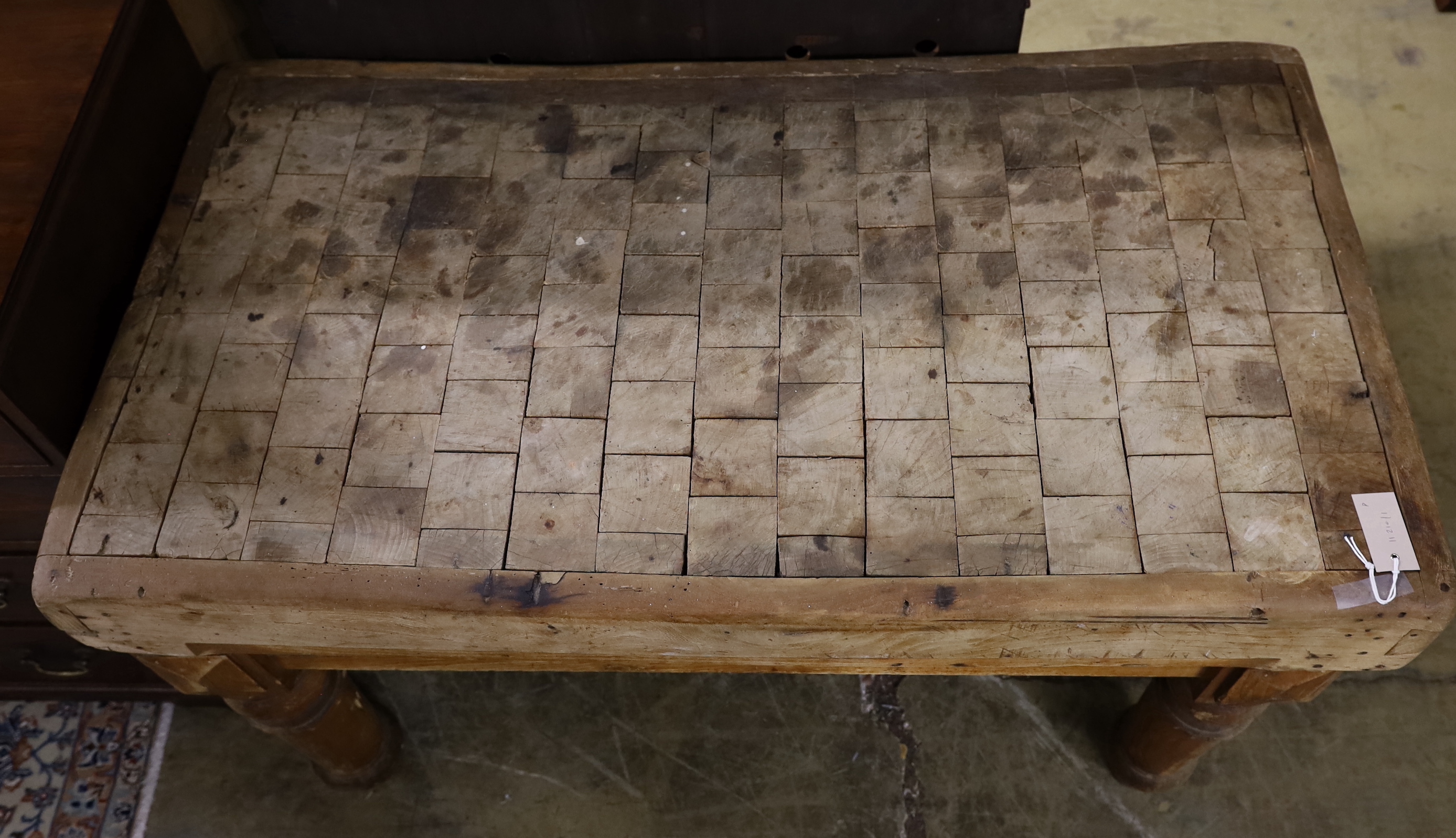 A Victorian rectangular pine and fruitwood butcher's block on stand, width 115cm, depth 65cm, height 71cm
